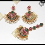 Naurtran earings teeka