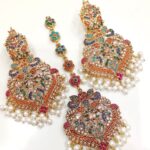 Naurtran earings teeka