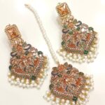 Naurtran earings teeka