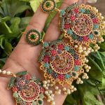 Naurtran earings teeka