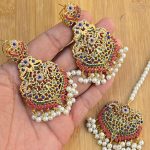 Naurtran earings teeka