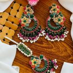 Naurtran earings teeka