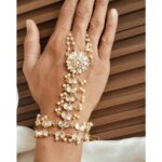 Hand bracelet with ring