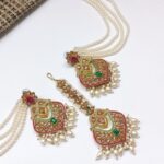 Naura earrings teeka