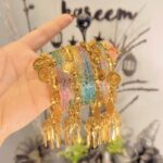 Coin bangles with rain drop